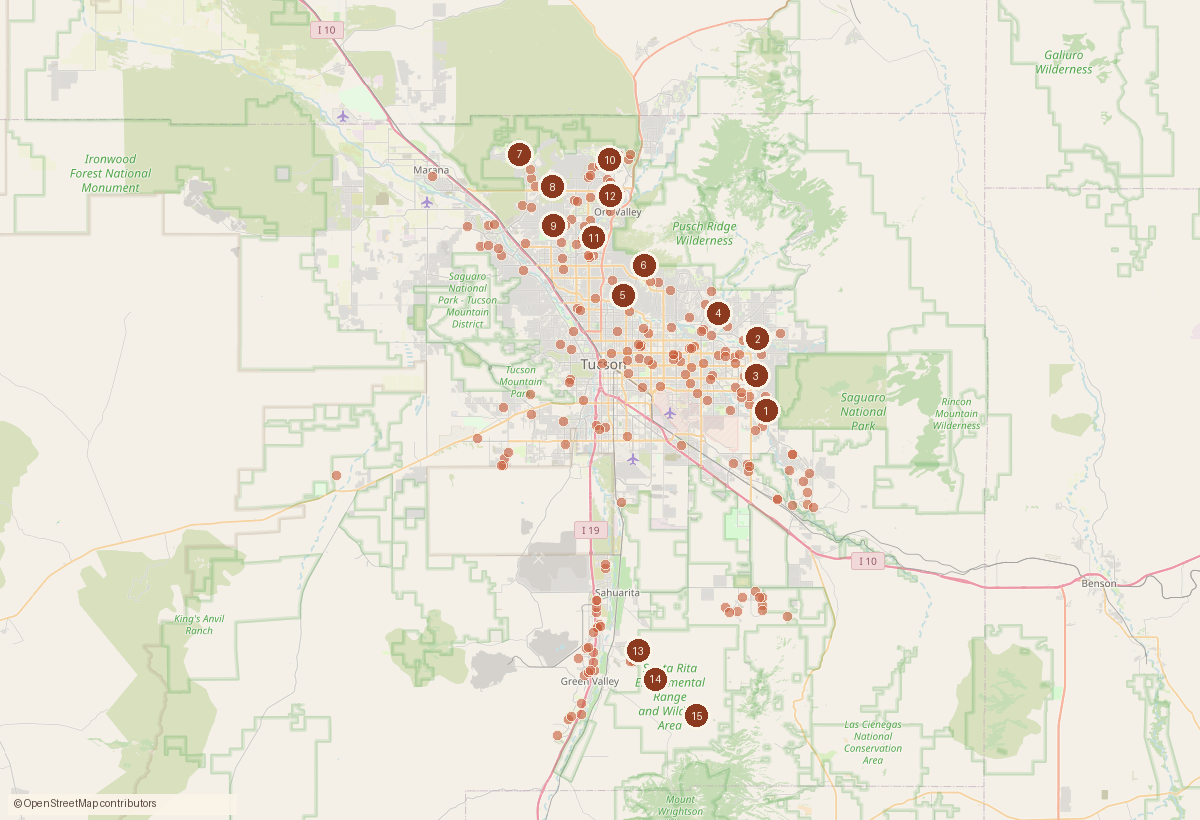 Map of the Tucson metro with a dot for each home sale recorded this week and numbered pins for the largest sales