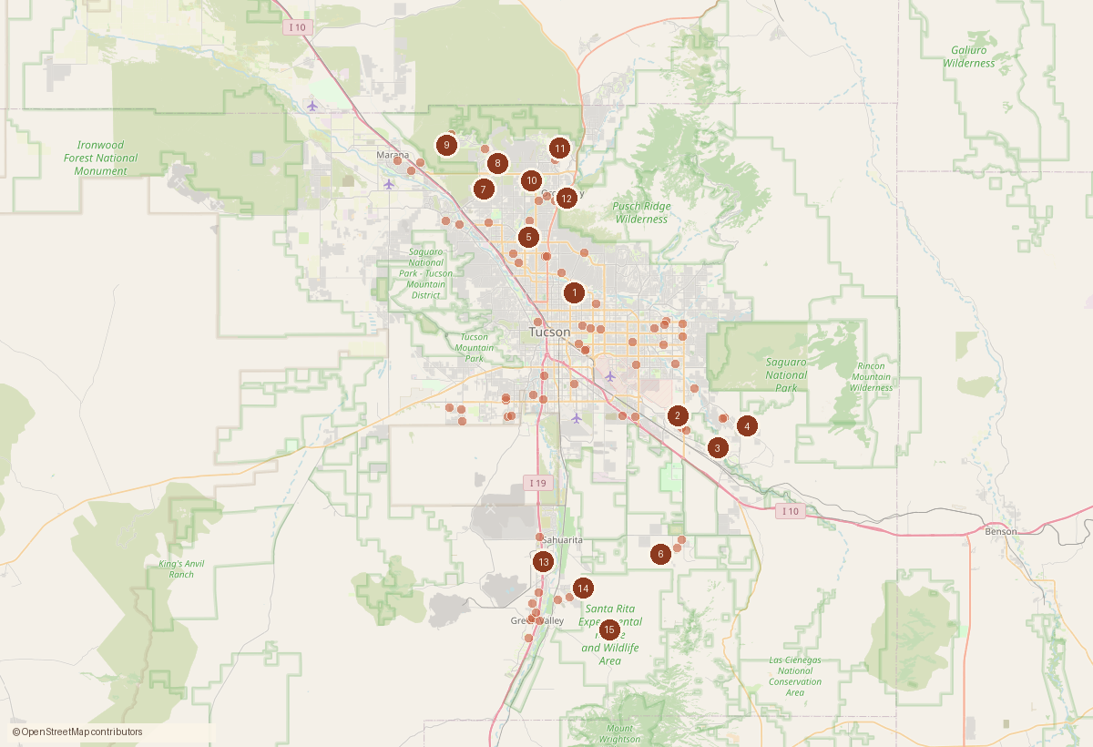 Map of the Tucson metro with a dot for each home sale recorded this week and numbered pins for the largest sales