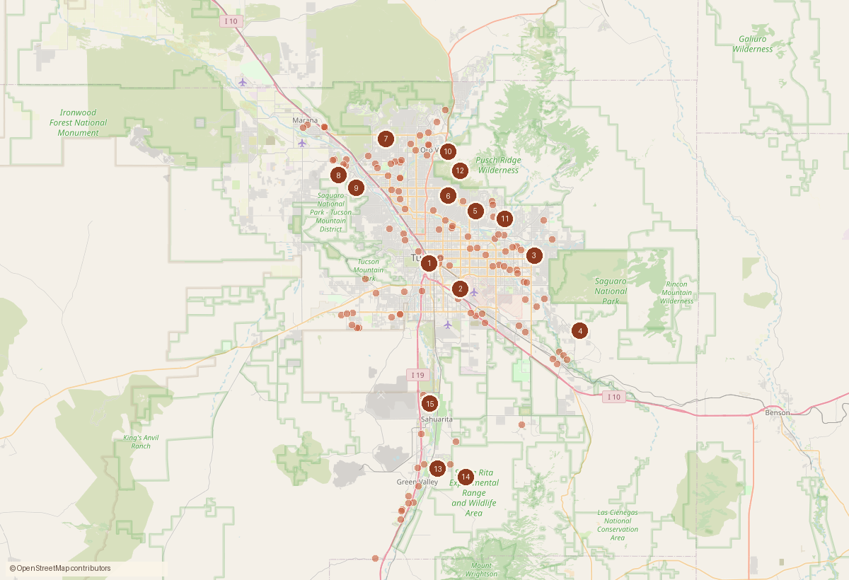 Map of the Tucson metro with a dot for each home sale recorded this week and numbered pins for the largest sales